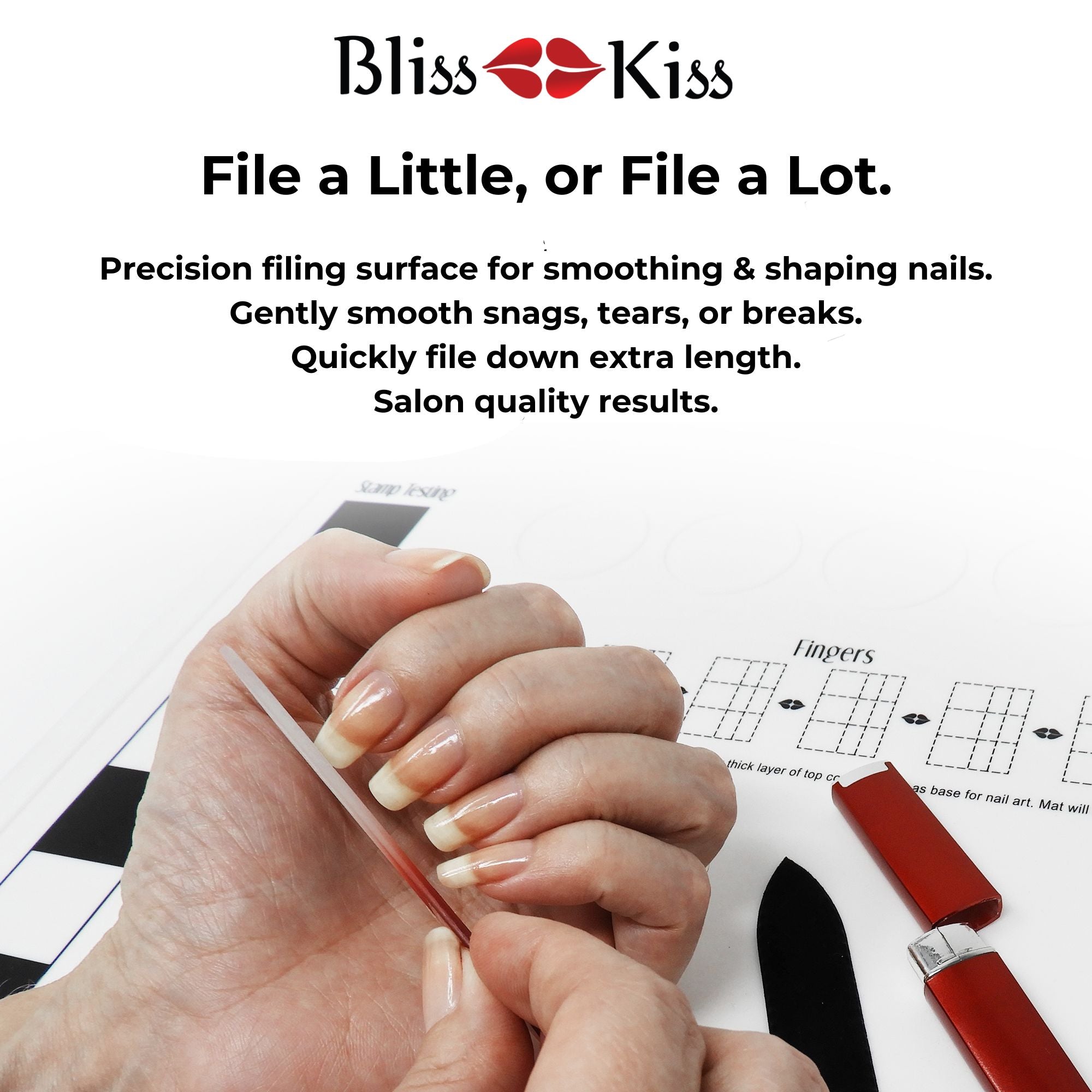 Bliss Kiss
File a little or File a lot.
Precision filing surface for smoothing and shaping nails.
Gently smooth snags, tears or breaks. Quickly file down extra length. salon quality results.
The blow image shows a well nourished and clean pair of extra strong nails. The nails are being carefully filed using a bliss kiss red nail file. in the background is a Bliss kiss silicone mat.