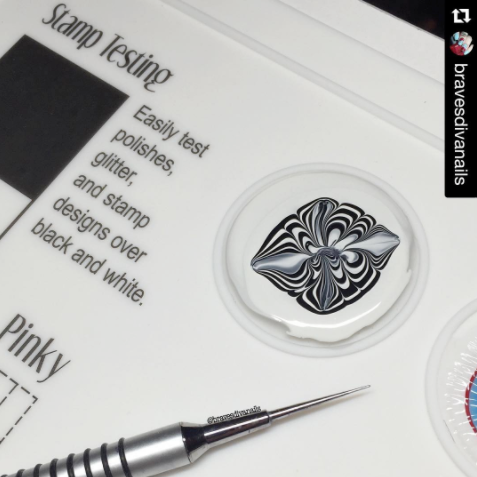 Retweeted by bravesdivanails
The image is showing how easy it can be to add a fun pattern or nail design using bliss kiss' silicone mat. the design is a fun swirled pattern in black and white.