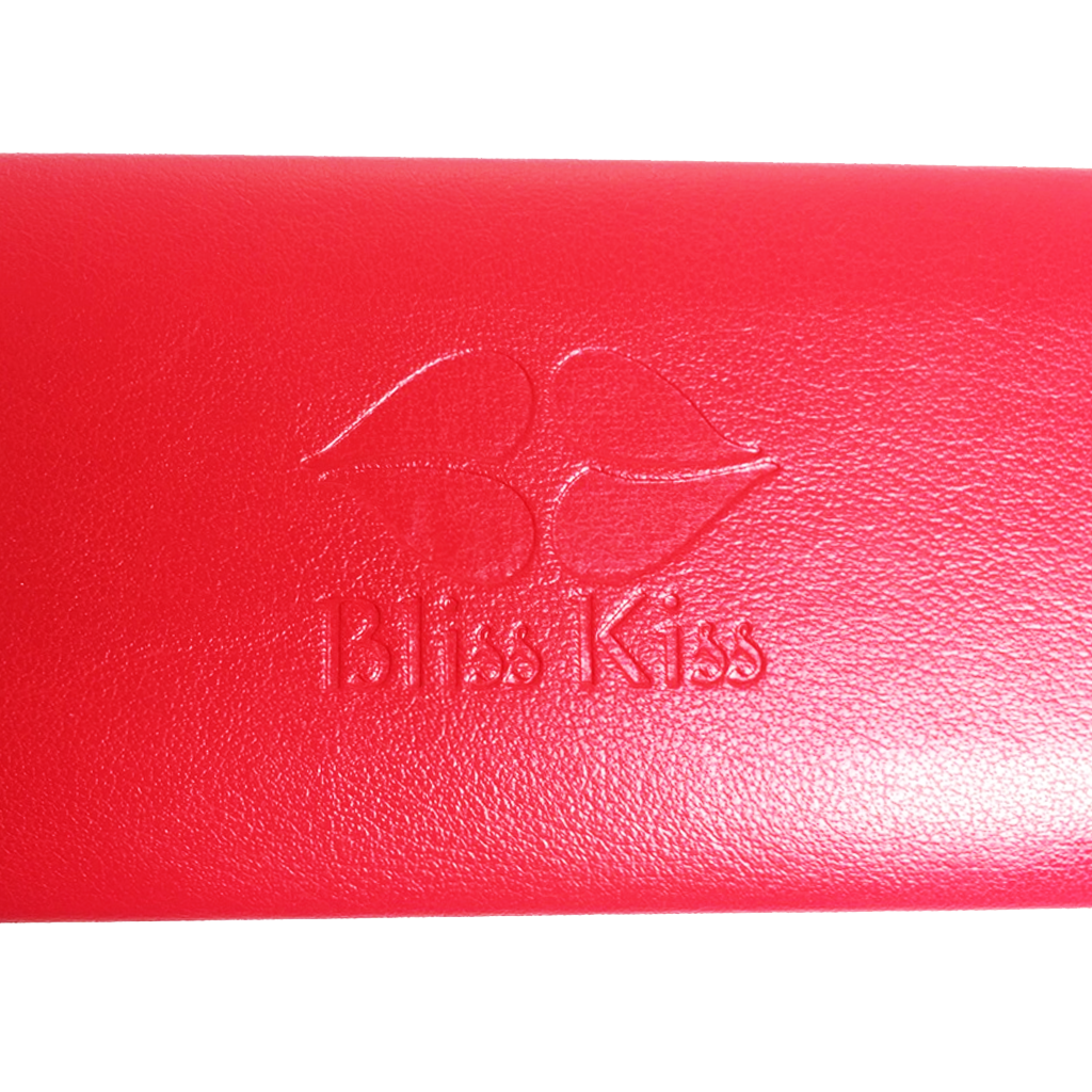 Stylish Bliss Kiss™ Carrying Case - Keep all your tools safely in one spot. Fashionable, portable, durable. Your Bliss Kiss™ Carrying Case is a gorgeous red faux leather with the Bliss Kiss™ logo embossed on top. You'll quickly wonder how you ever lived without it! Dimensions: 6" wide x 1" tall x 2.25" deep.